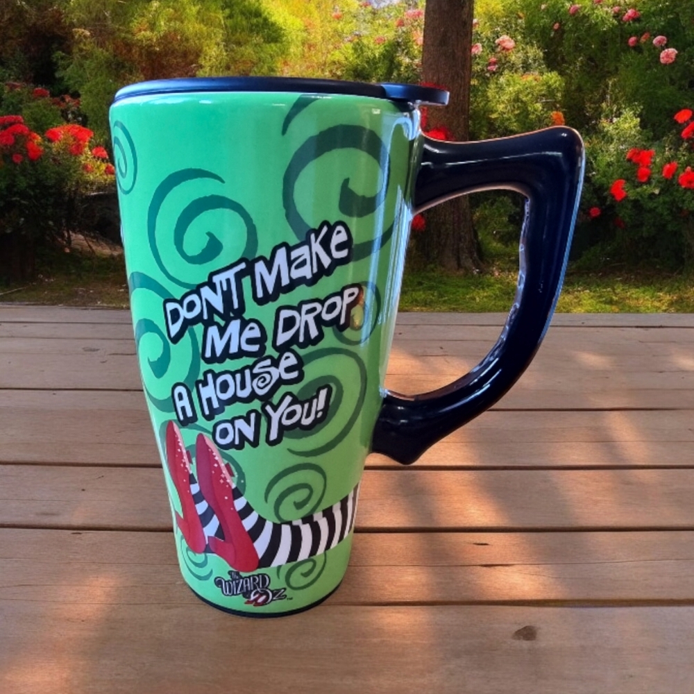 Wizard of Oz Ceramic Travel Mug "Don’t Make Me Drop A House On You"
